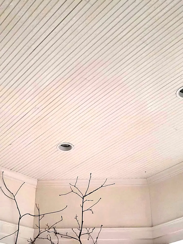 After: The same porch ceiling after specialty cleaning, with the soot and smoke staining removed